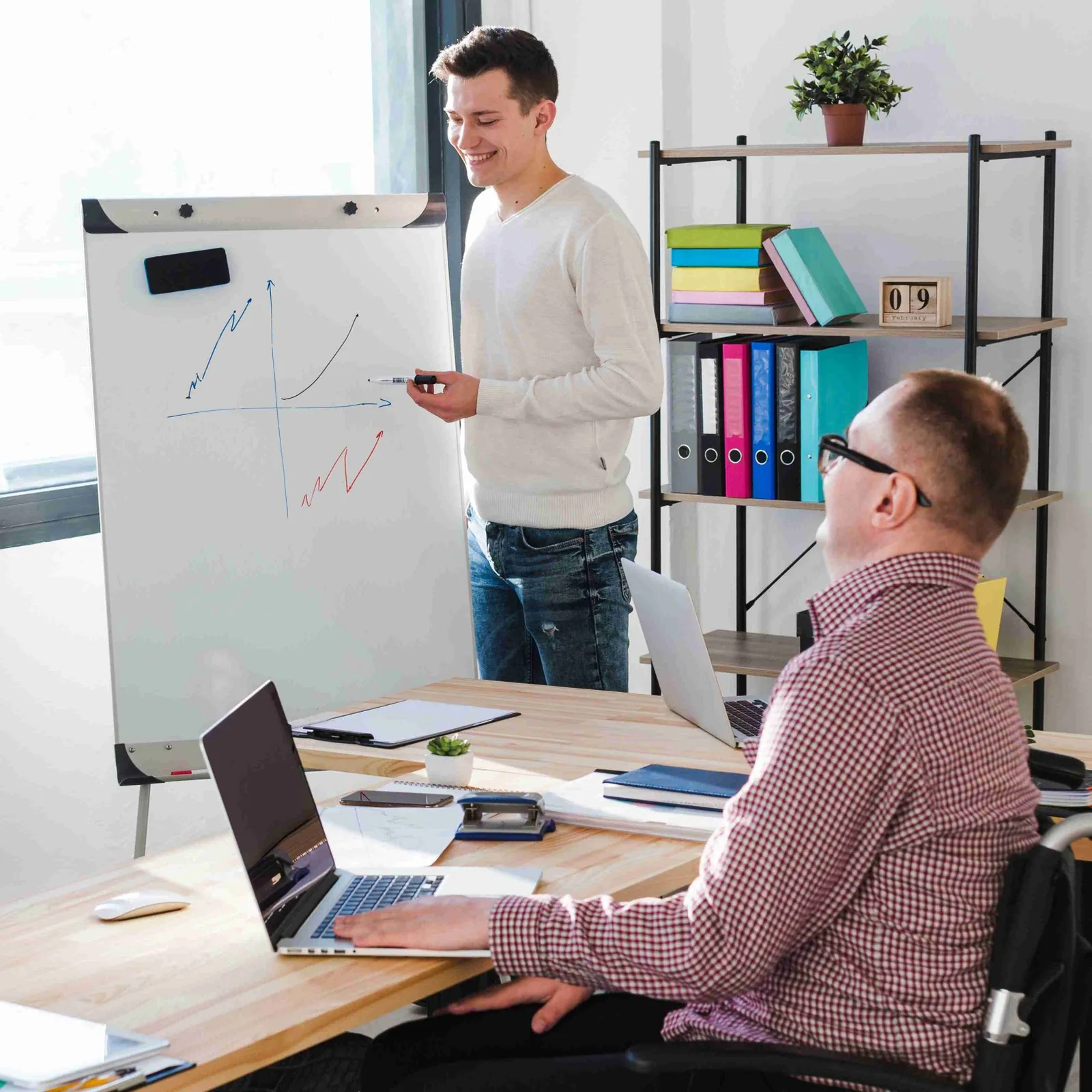 Modern office with web designers collaborating